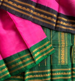 Gulaabi is a traditional Gadwal cotton in rose pink with pure silk Ganga-Jamuna borders in forest green and black and pure silk palla in green.