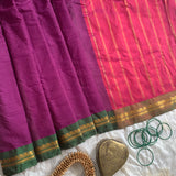 Snigdha is a traditional Gadwal cotton in orchid purple with silk-cotton borders in gren and cotton palla in pink.