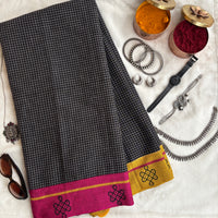 Shashwati handwoven Patteda Anchu saree with kolam print