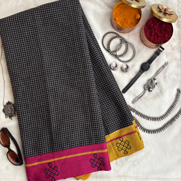 Shashwati handwoven Patteda Anchu saree with kolam print