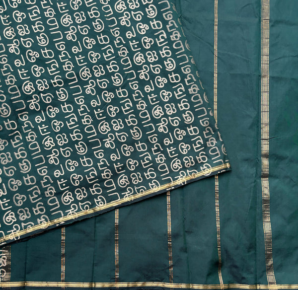 Tvarita blended silk saree with golden Tamil print