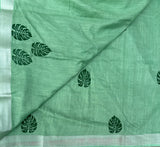 Fizzy apple linen sari with Monstera leaf print - The Maggam Collective