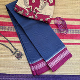 indigo handwoven naranyanpet cotton saree with a blouse piece that has hand printed cows all over