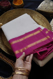 Hera is a traditional Gadwal cotton in white with pure silk borders and pure silk palla in royal pink.