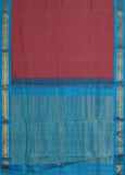 Ahalya is a traditional Gadwal cotton in light red with pure silk borders and pure silk palla in cyan blue.