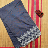 Off duty denim saree with intricate cutwork border