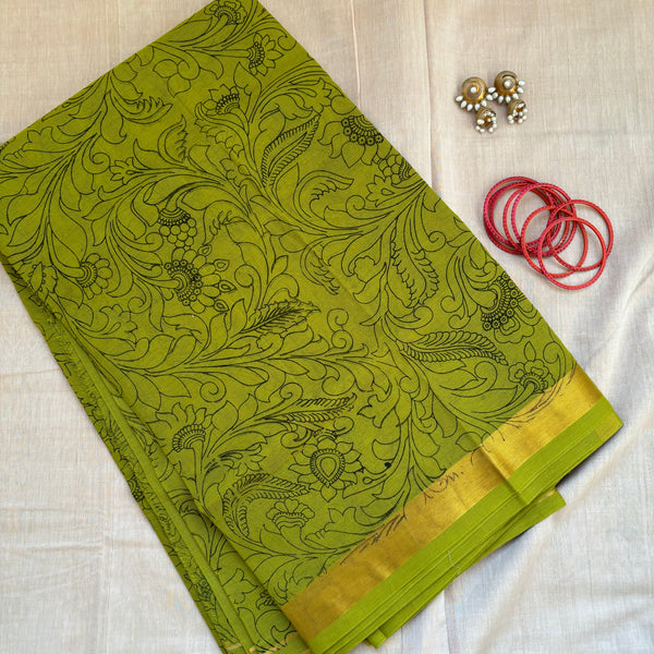 Light green Venkatagiri saree with slim golden khaddi border and Kalamkari outline print all over
