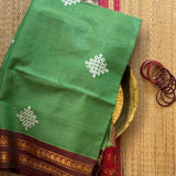 Nanditha Handwoven sico Gadwal saree with embroidered Kolams - The Maggam Collective