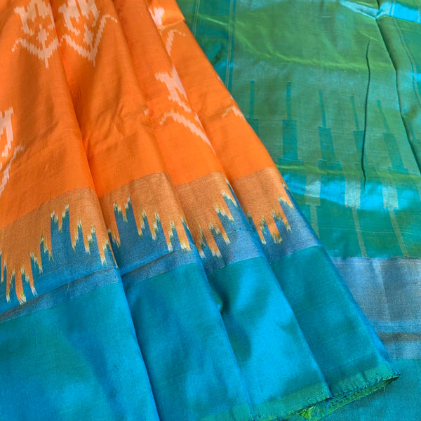 Yaami - Handwoven double ikat silk in orange and cyan