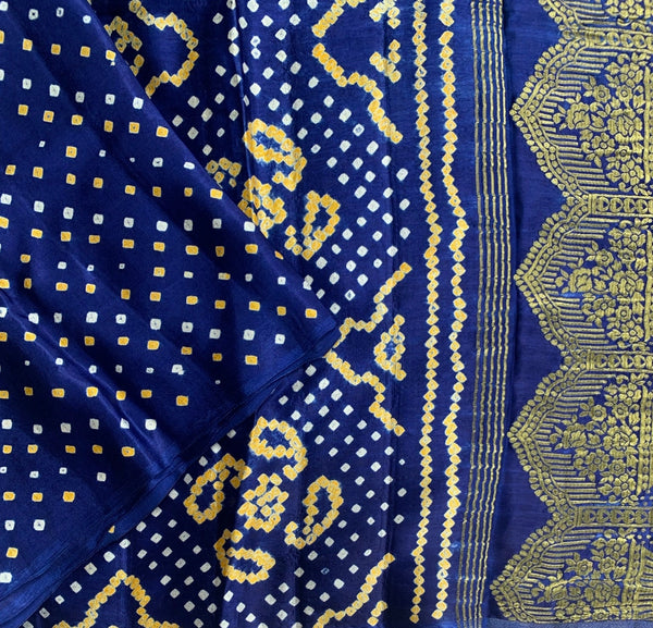 hand knotted bandhej on royal blue with tissue pallu